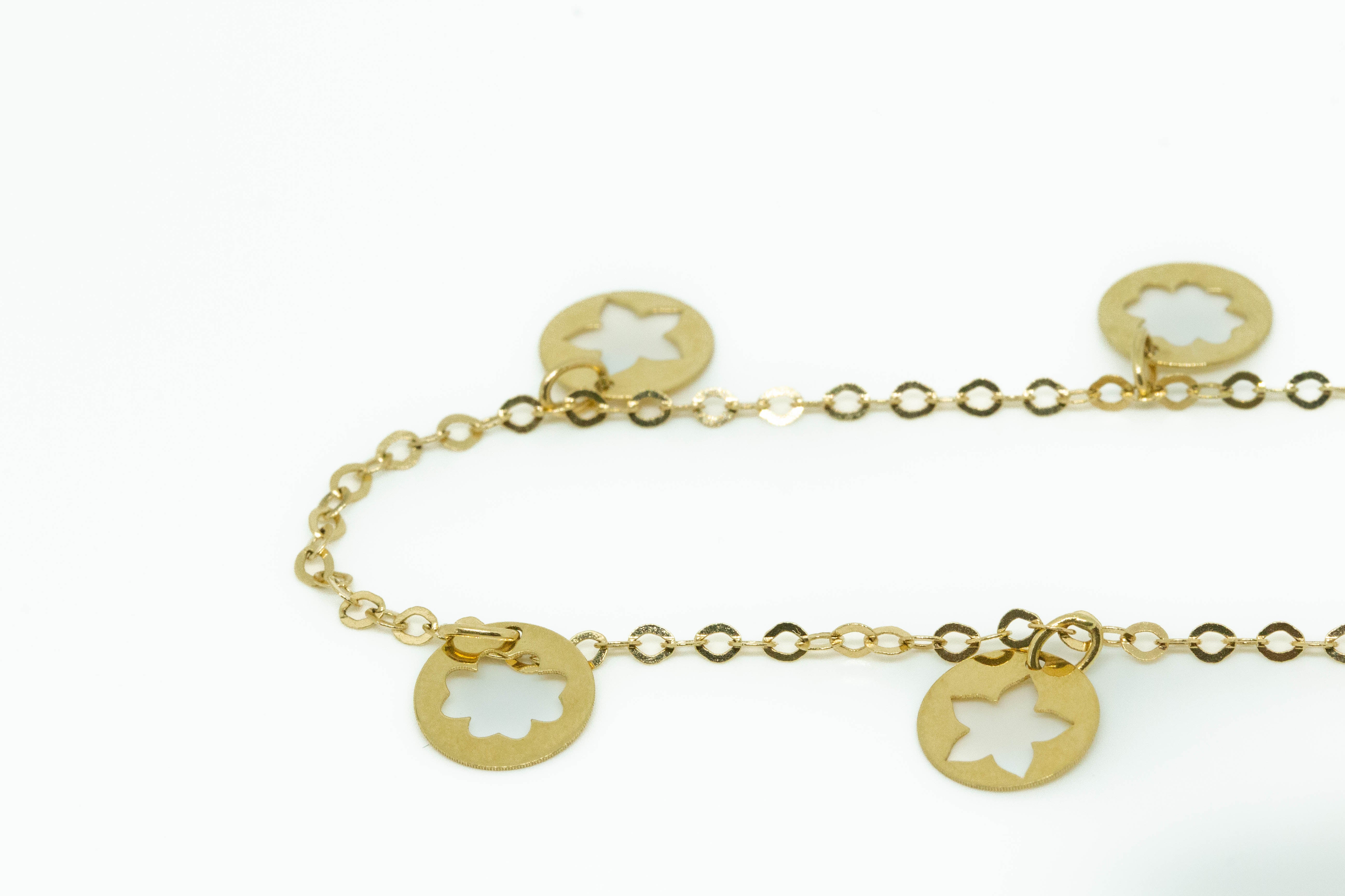 Pulsera Oro Amarillo 18 k colgantes.